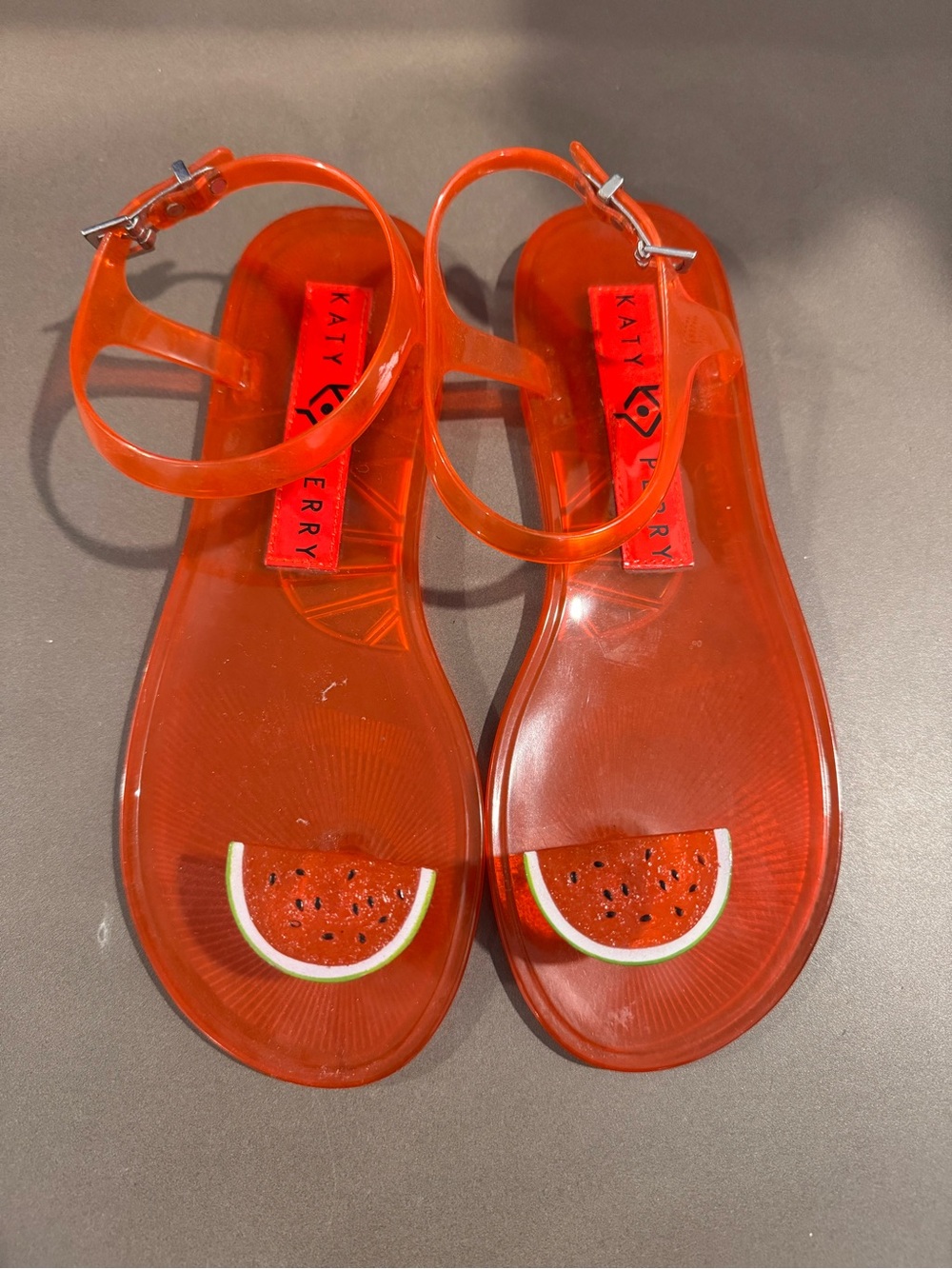 Katy Perry Collections Transparent Orange Jelly Sandals with Watermelon Accent